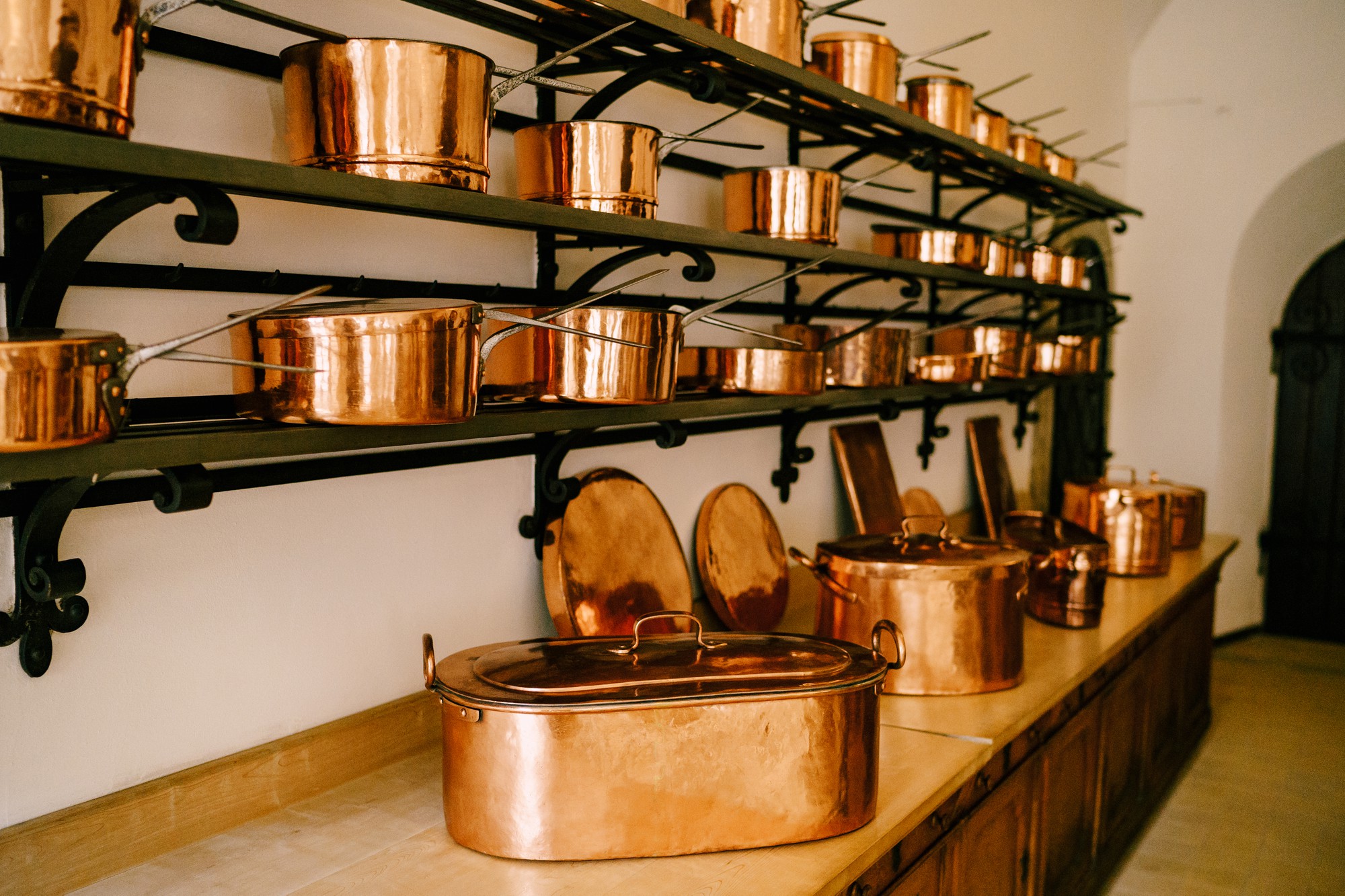 Small studio kitchen with copper pans