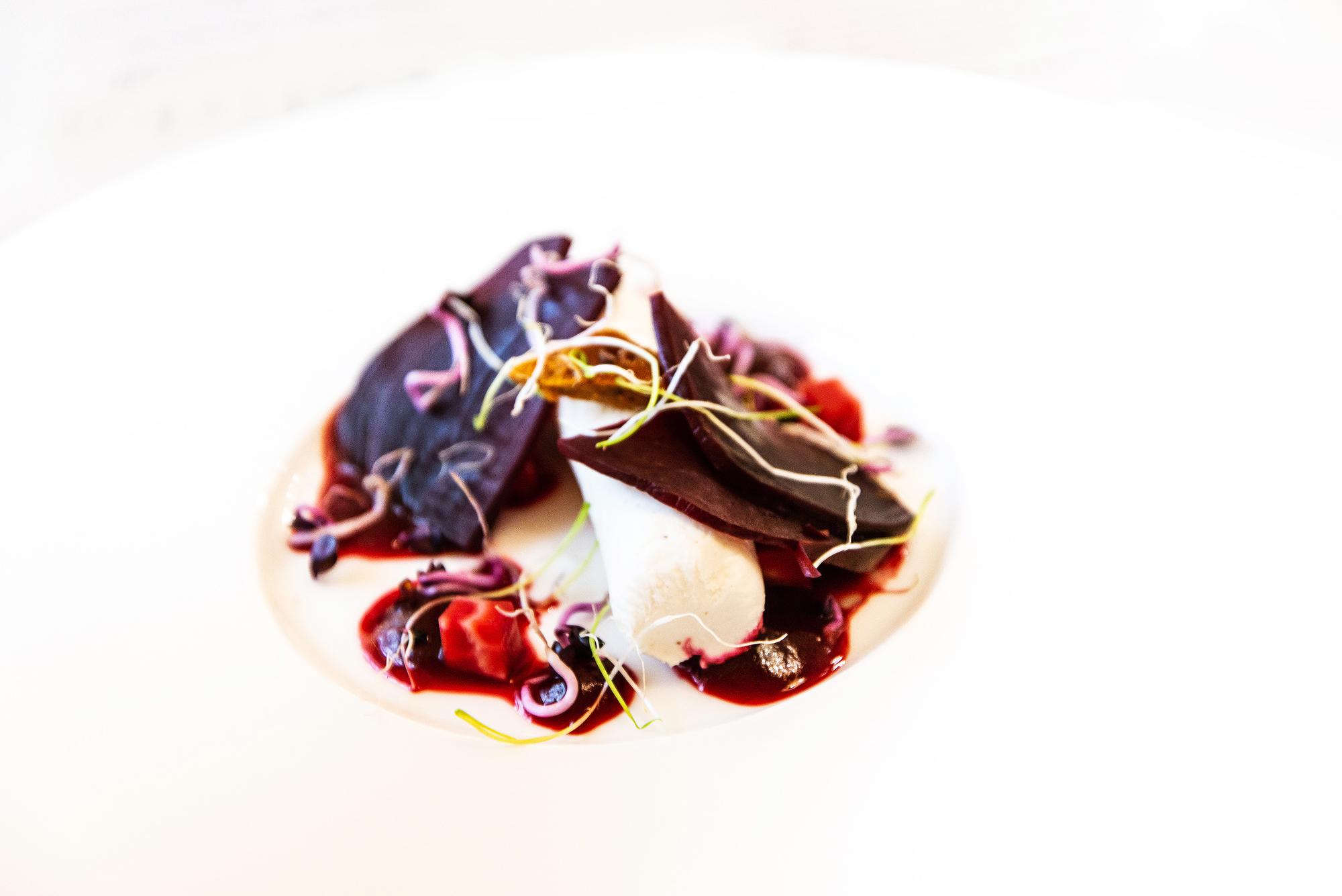 Chef plating a seasonal dish